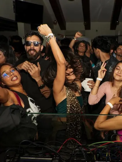 The crowd at High Spirits is pure energy. Hands in the air, singing along, and vibing all night.