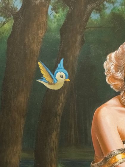 A close-up of "Moonlight and Monroe," focusing on the Disney-esque bluebird, a touch of innocence in a serene scene.
