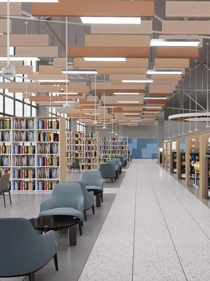 A view of the library at Amity University, Hyderabad, showing comfortable armchairs for relaxed reading. We create a mix of private and collaborative spaces to ensure diverse learning environments.