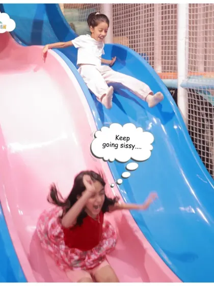 Keep going, sissy! Our multi-lane slides are perfect for siblings and friends to race down together, landing safely in a soft ball pit.