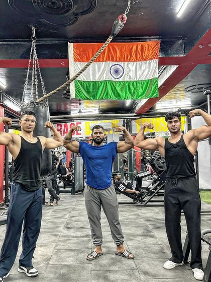 Posing with my gym brothers under the Indian flag. We are a team united by our passion for fitness and our pride in our country.