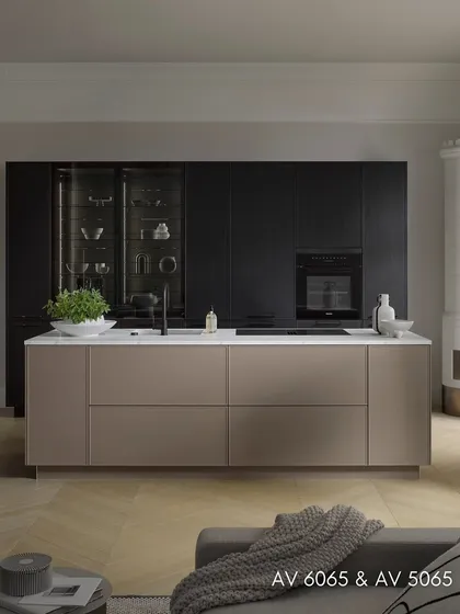 Another view of the AV 6065 and AV 5065 kitchen, showing how the design integrates with a classic interior, complete with a traditional tiled stove.