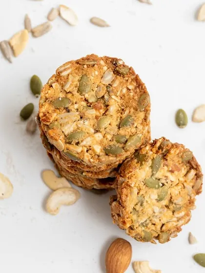 Another view of our wholesome cookies, showing the beautiful texture from all the different seeds and nuts. They are as beautiful as they are nutritious.