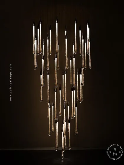 The full form of the crystal droplet chandelier, a stunning centerpiece that commands attention and sets a tone of pure luxury and elegance.