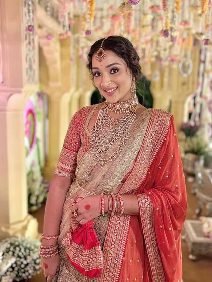 A joyful, candid shot that captures the festive spirit of the event.