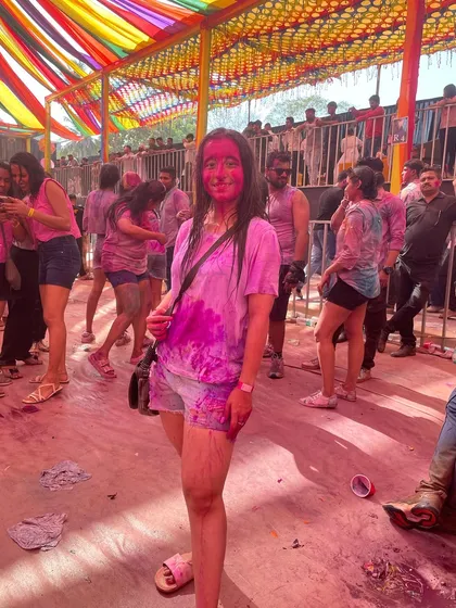 A fun, candid moment from the festival of colors. My happy-go-lucky vibe helps me connect with people and create a positive atmosphere at any event.