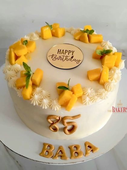 A simple and delicious vanilla and mango cake for an 85th birthday. Topped with fresh, sweet mangoes, this cake celebrates the best of the summer season and is a perfect, light option for any celebration.