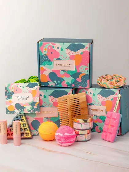 A look at one of my colorful gift hampers, filled with bath bombs, lip balms, wax melts, and more. It's a box full of self-care and happiness.