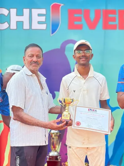 A player receiving his certificate and trophy for his achievements in the SCA Cup.