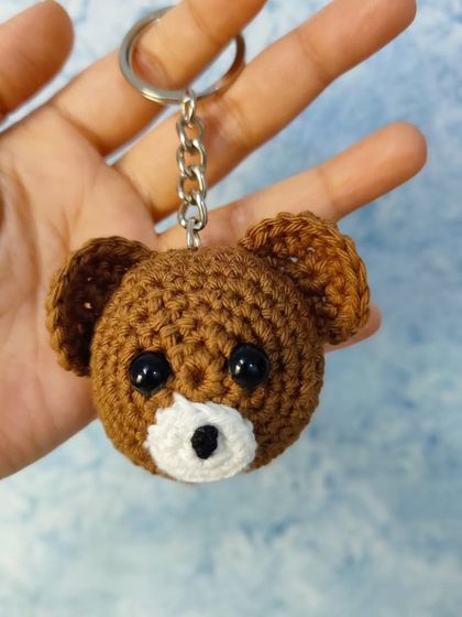 Another look at the handmade bear keychain. I use safety eyes to ensure they are secure, and the cotton yarn makes them soft to the touch.