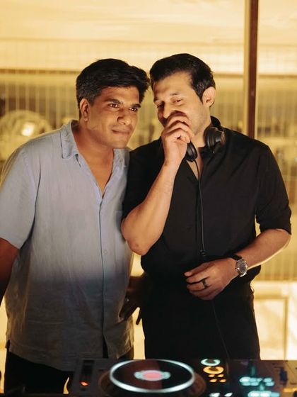 A candid moment with my manager, Salim. We're celebrating two years of a rollercoaster ride and aiming for even greater heights.