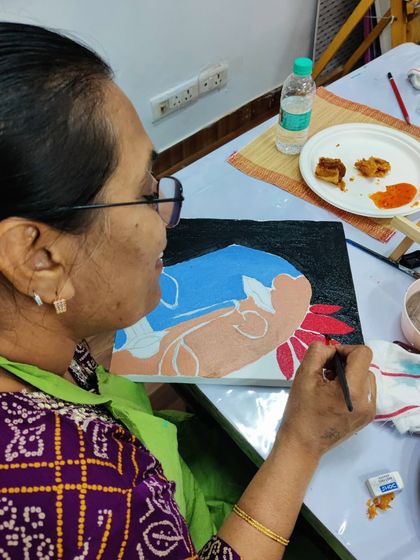 More scenes from our acrylic workshop for doctors, showing the focus and enjoyment as they mix colors and bring their canvases to life.