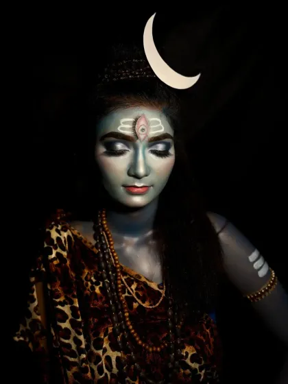 A full-body shot showcasing the complete Lord Shiva look, including the blue body paint, traditional attire, and Rudraksha beads. This demonstrates a complete character creation from head to toe.