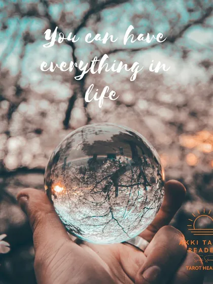 A crystal ball reflecting the world, a reminder that with the right perspective and clarity, you can have everything you desire in life.