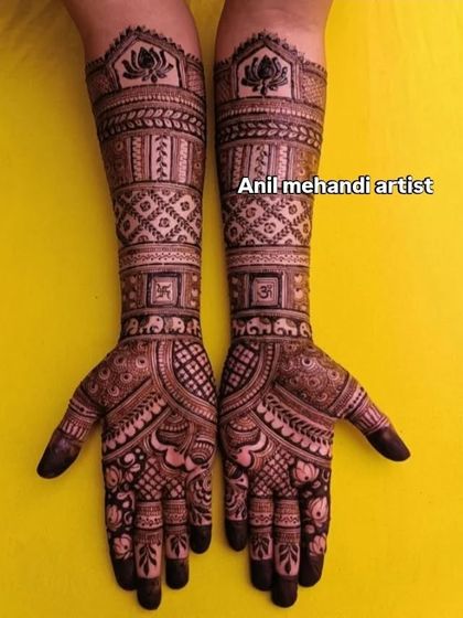 This design features a lotus motif at the top, with bands of geometric and jaal patterns down the arm. The small swastika symbol adds an auspicious touch.