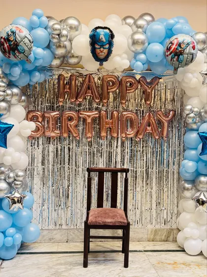 A closer look at the Captain America themed birthday backdrop, perfect for photos.