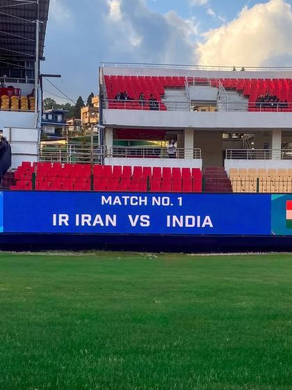 The digital scoreboard displays the matchup between Iran and India. We provide and operate all on-field screens, including scoreboards and giant replay screens.