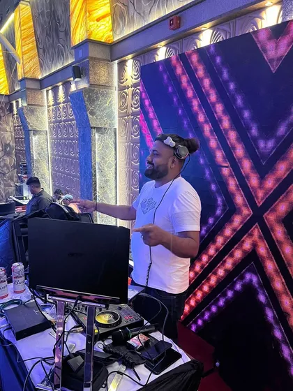 A candid shot of me enjoying the music at a Goan wedding. I have a genuine passion for these events and a deep collection of Konkani and Mando music.