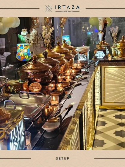 A glamorous buffet line with geometric-patterned flooring and custom-designed golden counters. This showcases my ability to handle high-end, designer events where every element is curated.