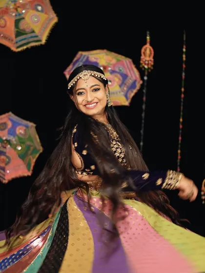 Another beautiful twirl from my Navratri shoot. The vibrant, multi-colored ghagra comes alive with every spin.