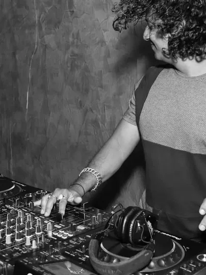A shot from a club night, lost in the music. I teach my students to not just play tracks, but to really feel the music and create a unique vibe for the audience.