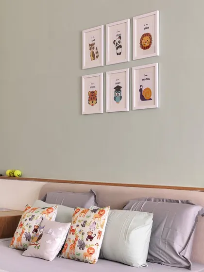 Another angle of the kid's bed, showing the custom ledge behind the headboard for toys and books.
