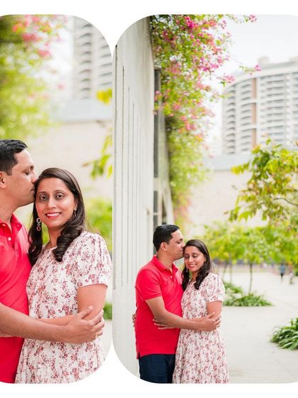 A sweet and romantic portrait of a couple, with the husband kissing his wife's forehead in a beautiful urban park.