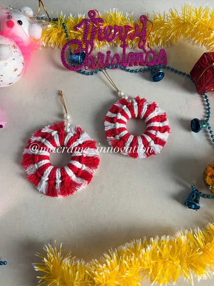 These mini peppermint-style wreaths are so festive. The red and white swirl is iconic for Christmas, and they make great tree ornaments.