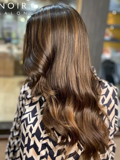 A gorgeous example of our "Wow Wednesday" hair colour. The highlights are perfectly blended and styled into soft waves for a stunning finish.