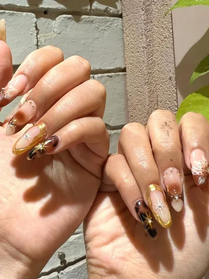 A rich and luxurious set featuring tortoise shell patterns, gold accents, and celestial details. All hand-painted for a flawless finish.