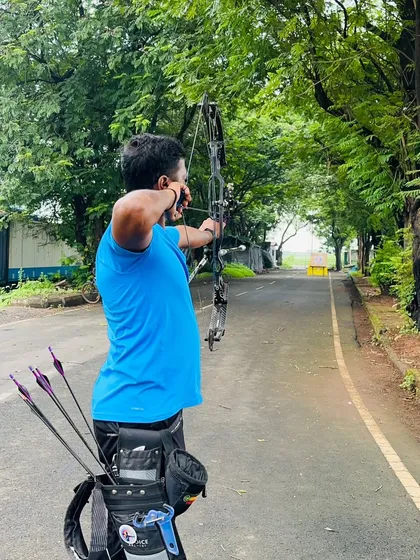 The final moment of aiming before the release. This shot captures the intense focus required in archery.