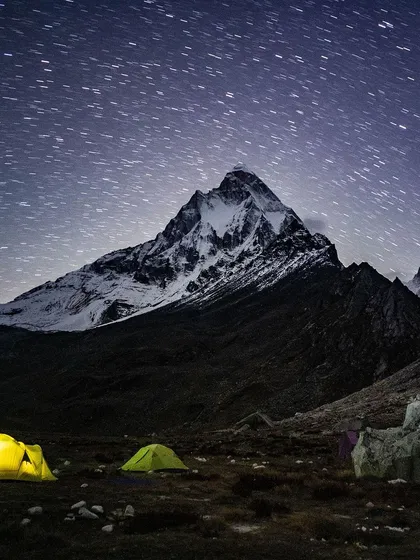 Under a moonless sky in Tapovan, with temperatures below freezing, the sacred peaks of Mt. Shivling and Meru were illuminated by stars. In these moments of profound stillness and cold, you feel a connection to something ancient and immense. It is a humbling reminder of nature's power to guide us toward awe and reverence.