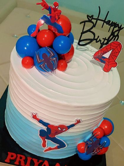Your friendly neighborhood Spiderman swings into action on this custom birthday cake. Designed for a 4th birthday, it features the iconic red and blue colours, spiderweb details, and Spiderman himself, ready to make the celebration super.
