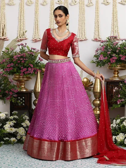 Another view of the pink and red lehenga, perfect for a sangeet or mehendi ceremony.