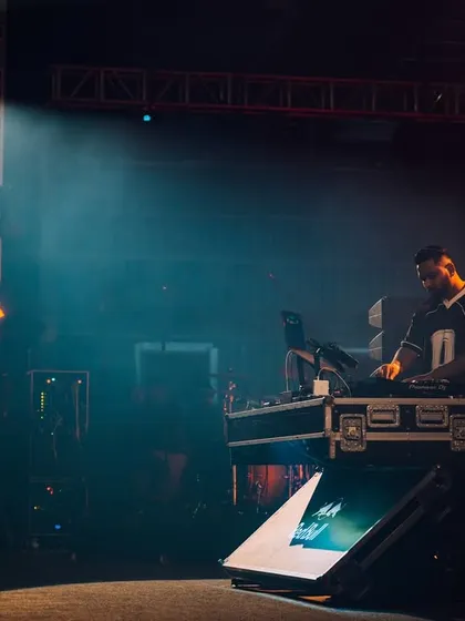 Under the spotlight at Gully Fest 2024. A solitary moment on a massive stage before the beat drops.