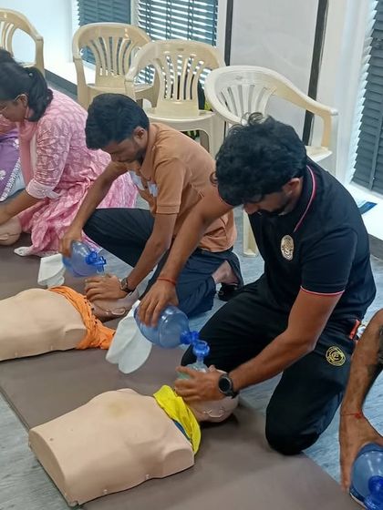 This image shows our group practicing rescue breaths with a bag-valve-mask device. This training covered a range of scenarios to ensure we are prepared for any situation.