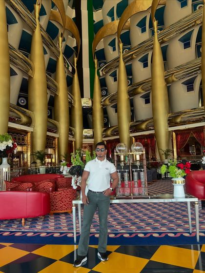 Even in the opulent lobby of a luxury hotel, our custom grey jeans hold their own, proving that great-fitting denim can be dressed up for any occasion.