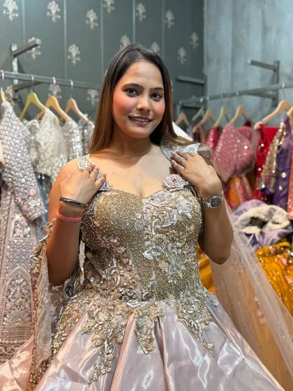 This client is glowing in her choice of a premium rental gown. The fit is perfect, and she's ready for her big event.