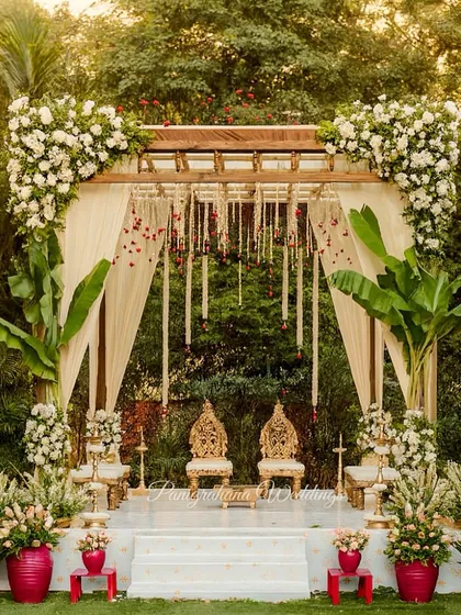As architects turned designers, we love blending structure with nature. This elegant mandap features a clean wooden frame, traditional banana leaf pillars, and lush white florals, creating a serene and timeless look for a South Indian wedding.