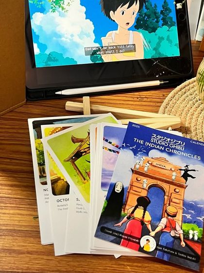 The calendar pages next to my iPad showing a Ghibli movie. This is my inspiration, and I hope my art captures a fraction of that magic for you.
