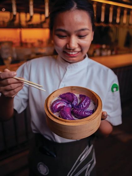 My travels through the Orient inspired these spicy chicken dumplings. Their vibrant purple color and herbaceous filling make them a treat for the soul and the eyes.