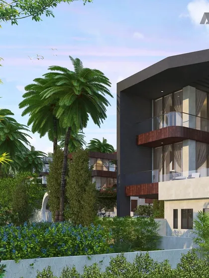 The entrance to one of the luxury villas at Evara. The design incorporates lush landscaping and a contemporary aesthetic to create a sense of sophisticated living amidst nature.