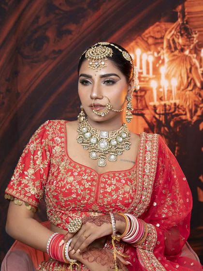 A stunning bridal portrait with a classic updo. The hairstyle is crafted to enhance the bride's features and provide a solid foundation for her veil and jewelry.