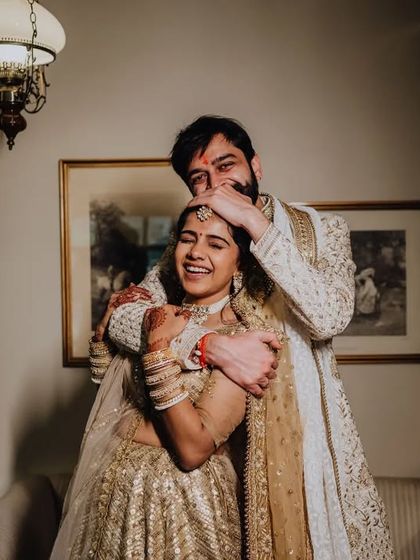 A playful and loving embrace, capturing the fun and affection in their relationship.