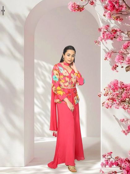 This vibrant floral print co-ord set is another fantastic option for a bridesmaid or wedding guest. It's fresh, modern, and perfect for a destination wedding.