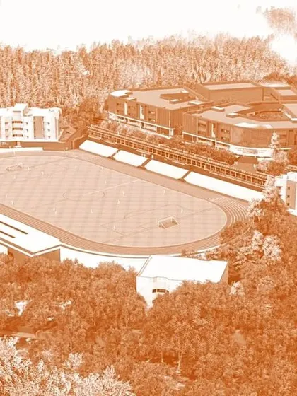 An illustrative masterplan for the new Sharada Residential School campus in Udupi. The design organizes the 18-acre contoured site around a central sports field, with academic and residential blocks positioned to foster a sense of community.
