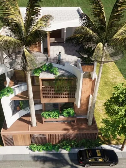 For this home, the design is literally built around nature. The structure makes way for two large palm trees, integrating them into the balconies and overall form, which I call the "Tree Hugger" concept.