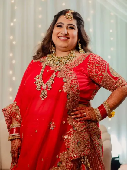 A collection of moments from this bride's reception. Her look was all about soft glam, with flowing waves and makeup that highlighted her joyful smile, creating a perfect look for her evening celebration.