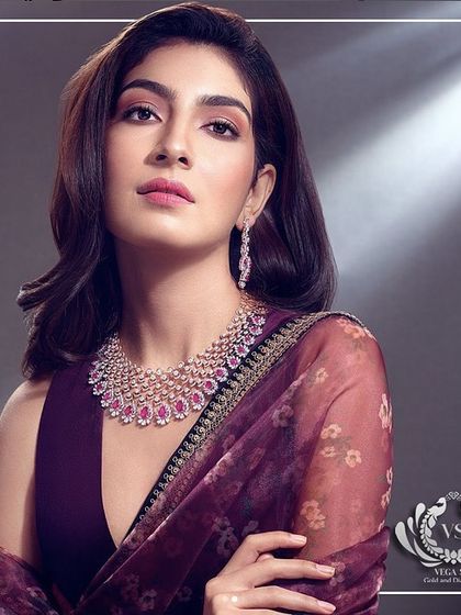A campaign for Vega Sri Gold and Diamonds where the jewelry is the star. I paired a stunning diamond and ruby necklace with a simple, elegant saree in a matching color palette to ensure the focus remains on the exquisite craftsmanship.