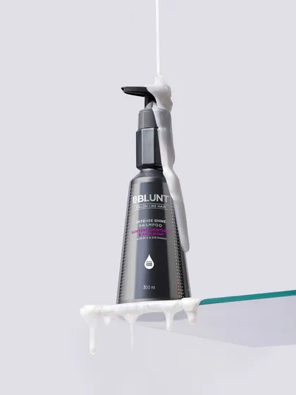 This levitation shot uses a thick, satisfying drip of shampoo to create a sense of motion. The product appears to float on a glass shelf, giving it a magical, high-end quality.